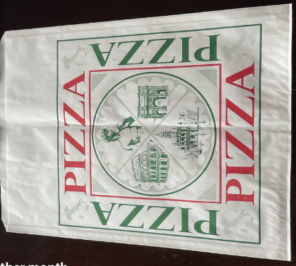 A Pizza Wrapping Paper With Pizza Printing
