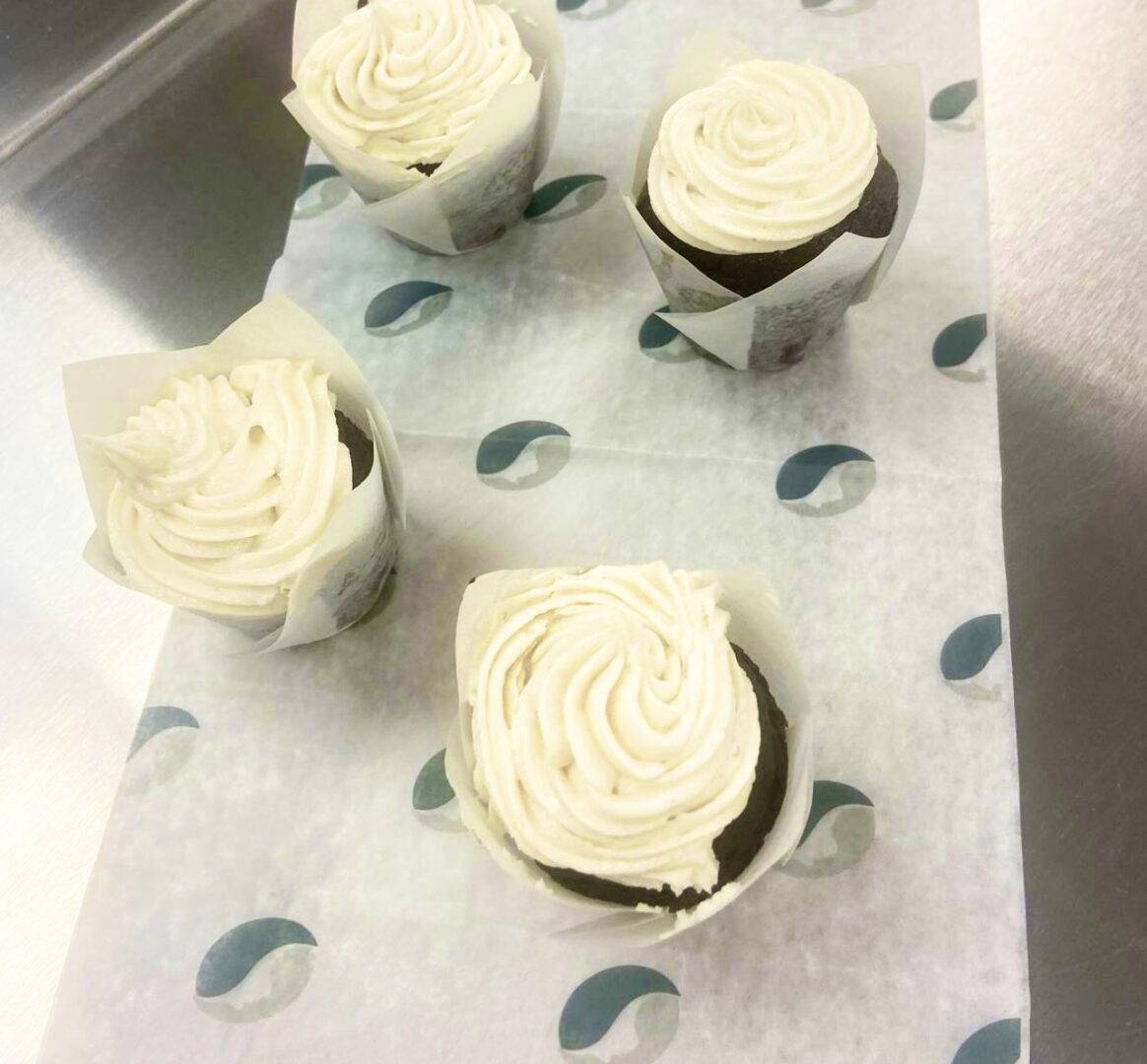A Cupcake Tissue Around a Cupcake With Rose Frosting