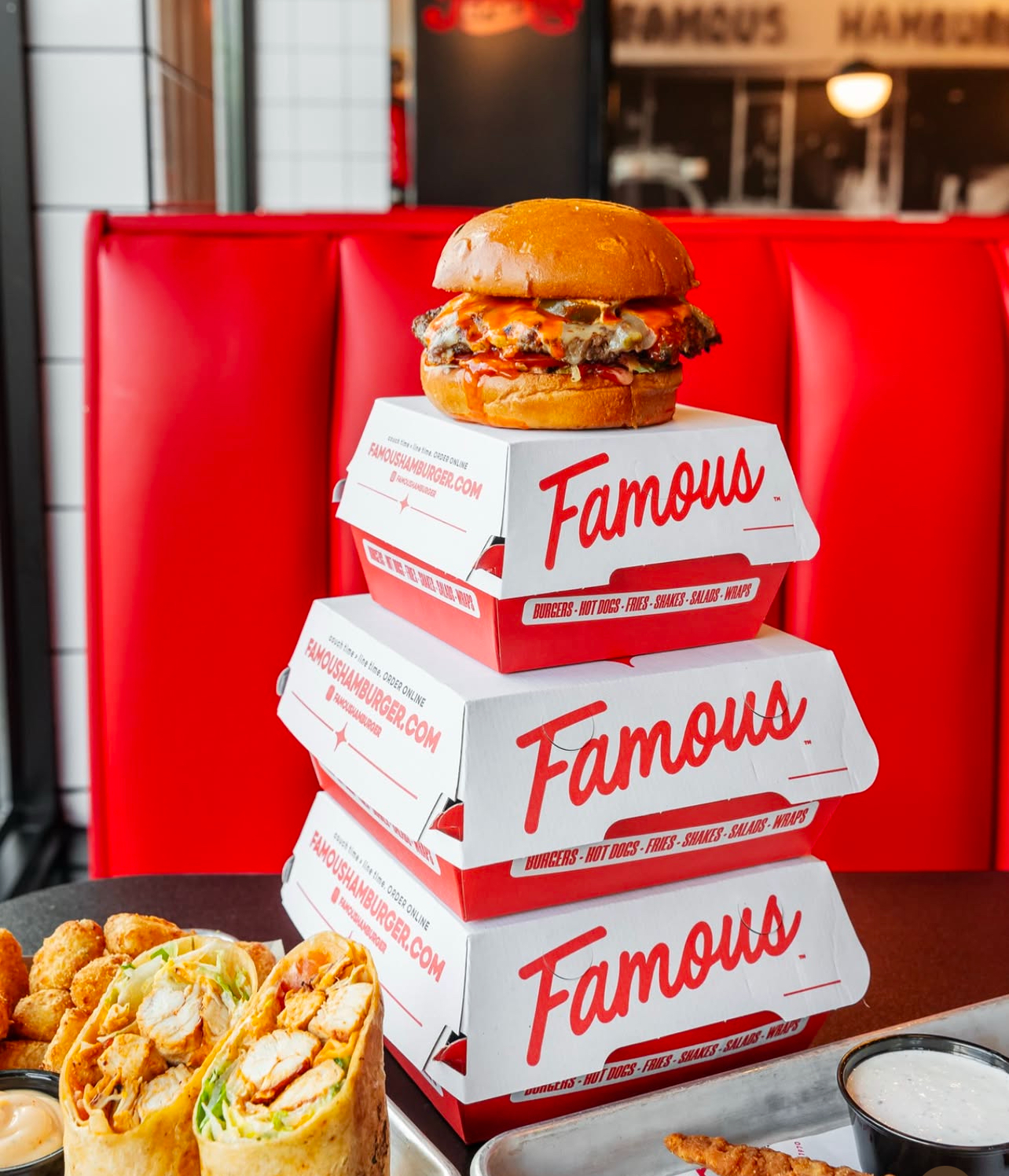 Famous burger stacked in boxes.