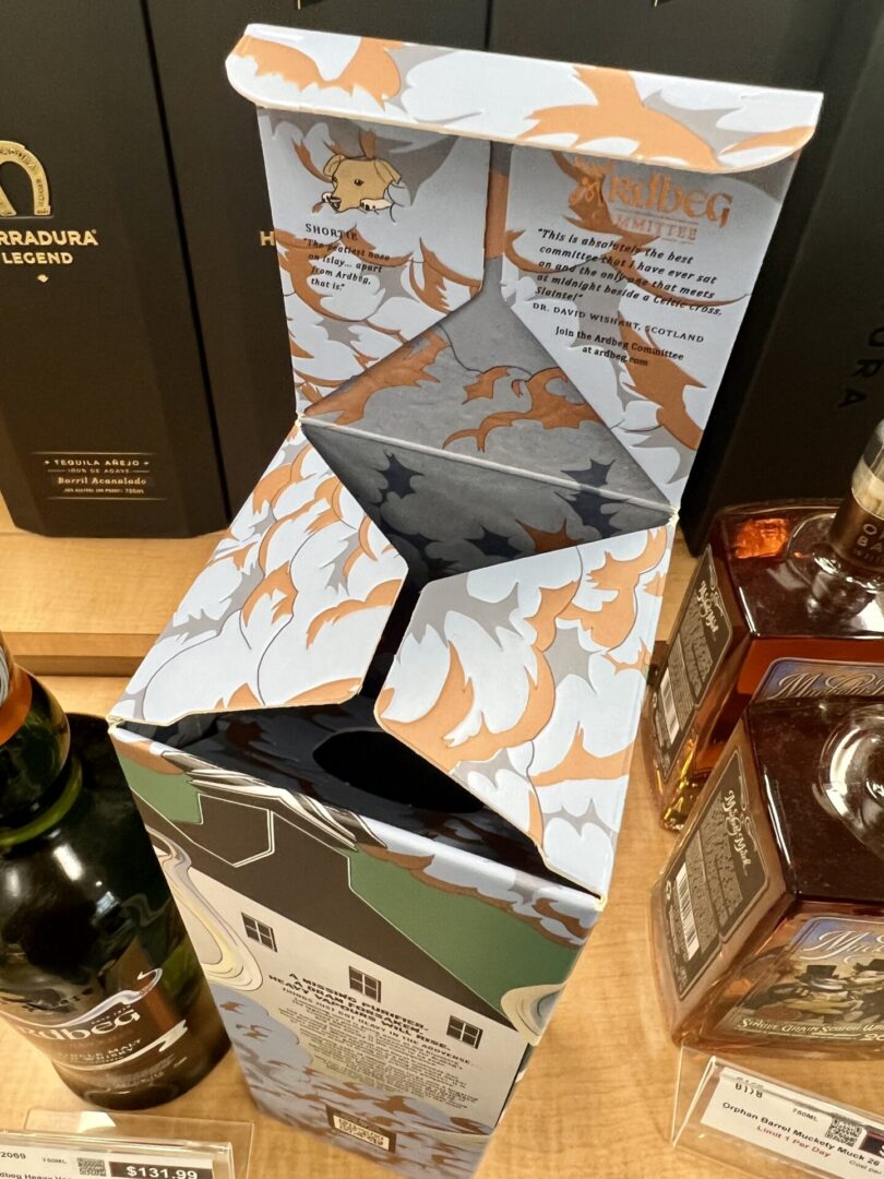 Ardbeg whisky box with dog illustration.