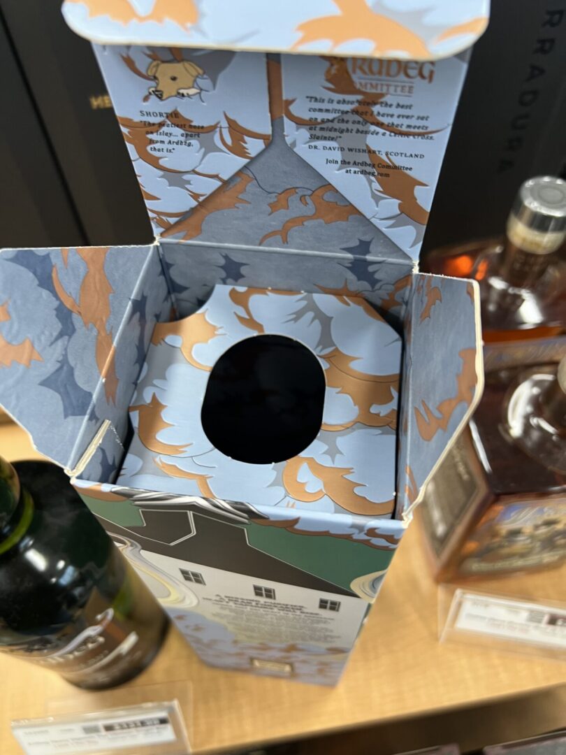 Ardbeg committee whisky box open.